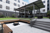 Interior courtyard with lounging, entertainment, and grilling stations